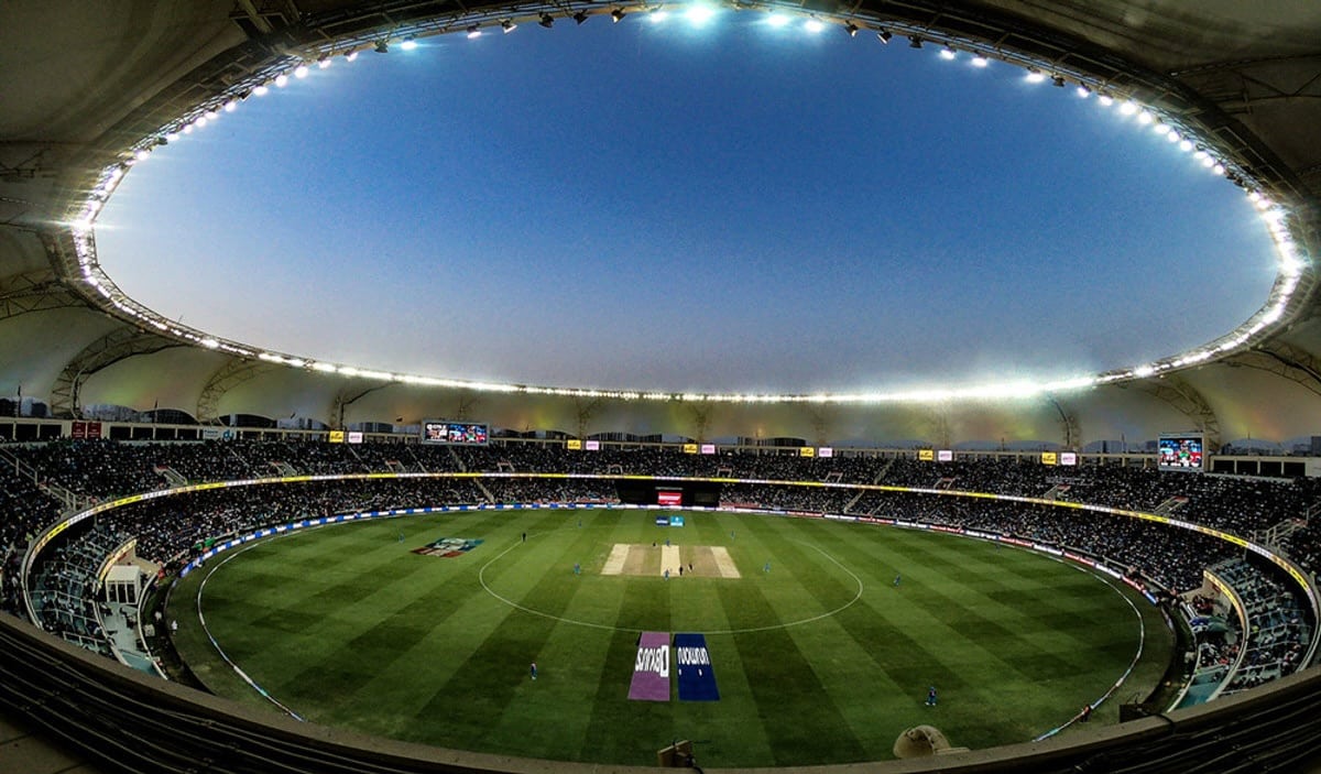 Cricket stadium banner with pathway CTA.