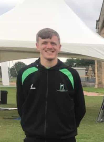 Adam Helsby residential cricket coach delivering coaching sessions for young players